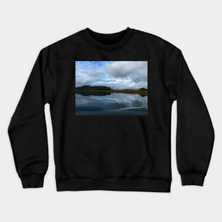 Lagoon reflections in a cloudy day Crewneck Sweatshirt